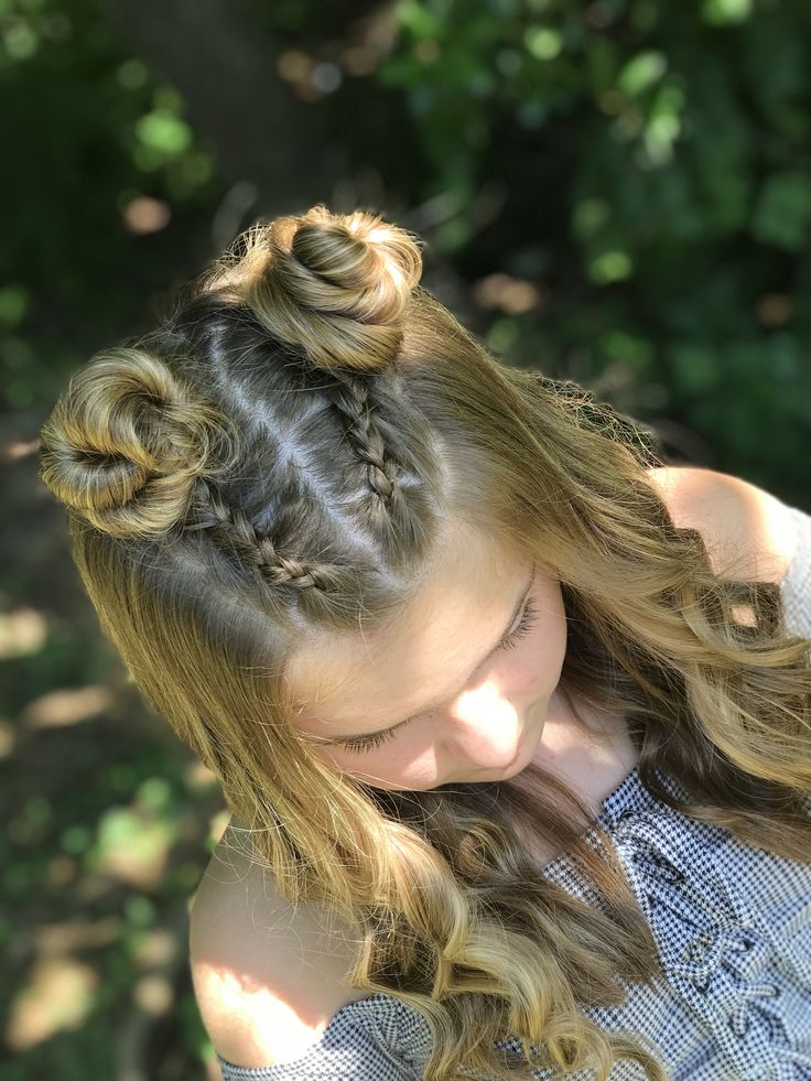 Girl with mini top ponytail. With double space buns on toast top