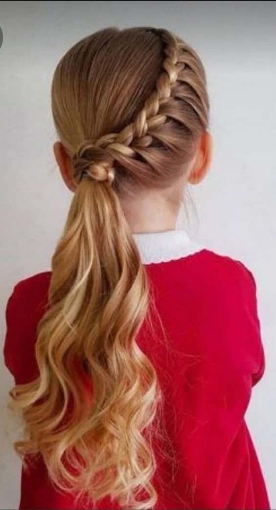 girl in red with a braided low side ponytail