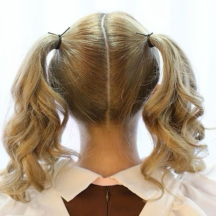 little girl with a cute double ponytail