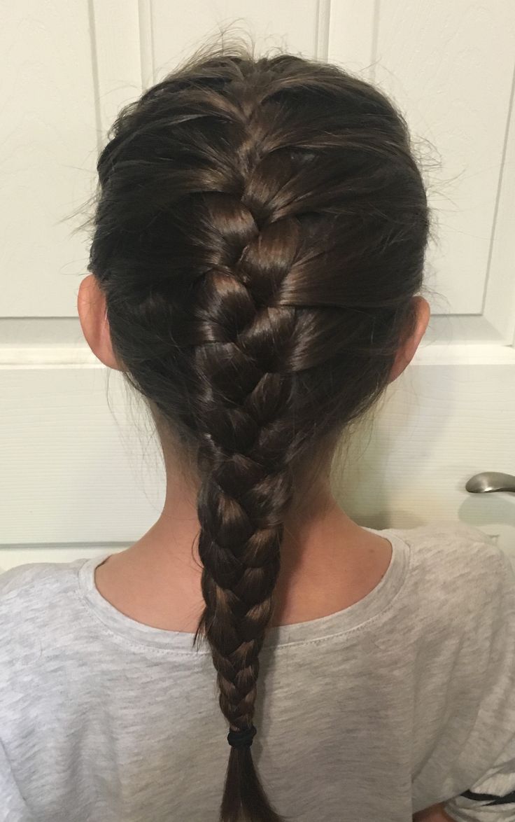 Single French braid pulled back from the hairline on a young girl