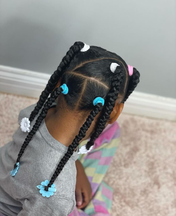 Black girl showing off her cute  long  4c hair with cute braided hair