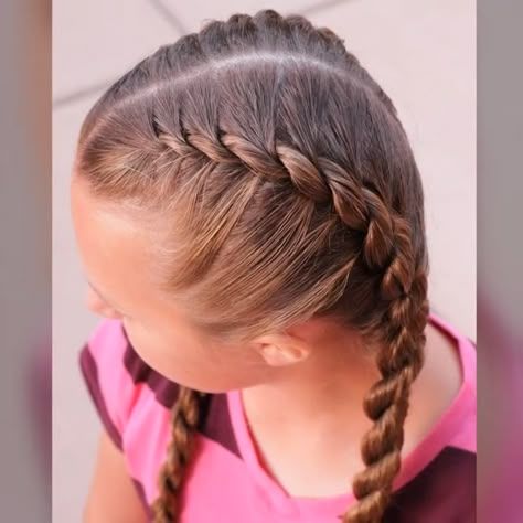 Young girl with a double rope twist style