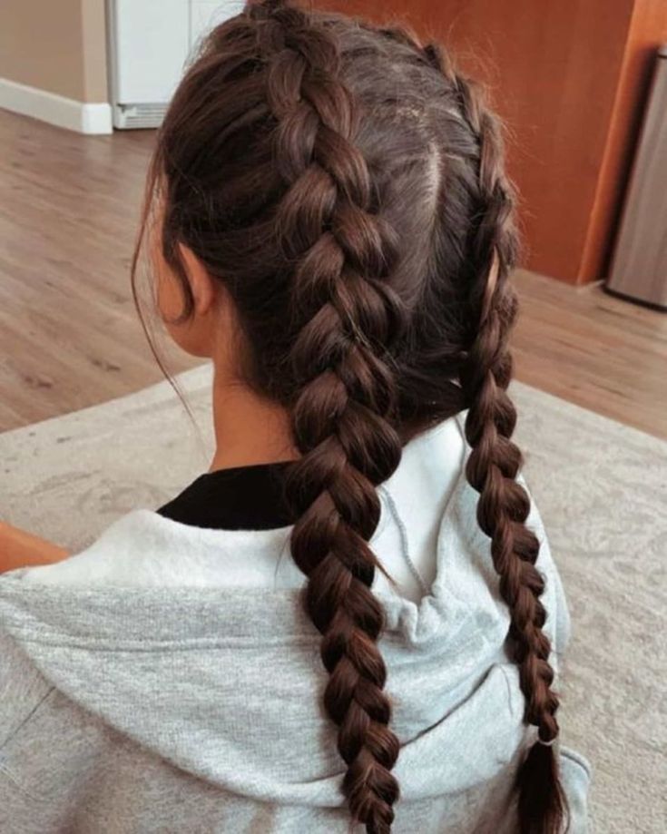 young girl with a cute double Dutch braids.