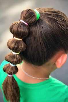 Young girl with bubble ponytail
