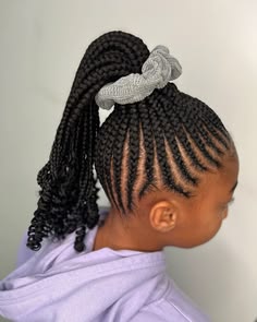 Young girl with Cornrows into a High Ponytail
