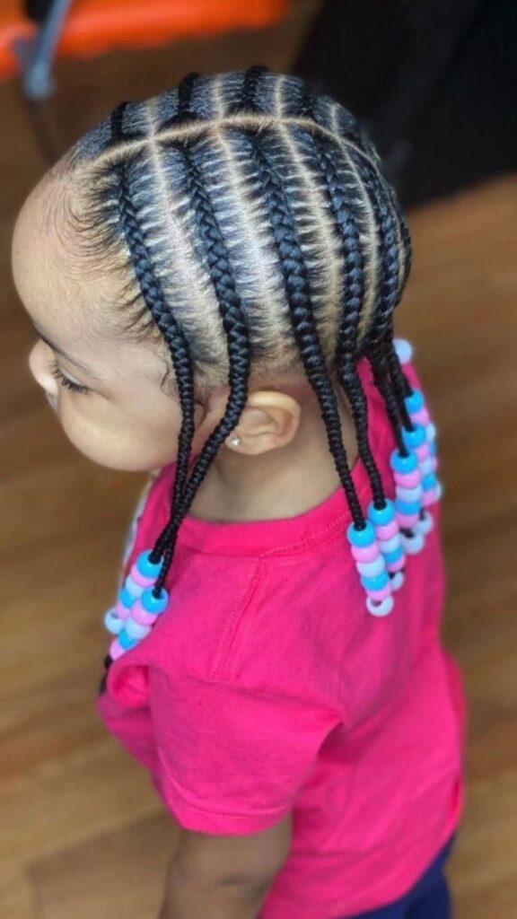 Cute girl with a tapered cornrow