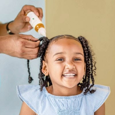 Scalp oil application for type 4 hair