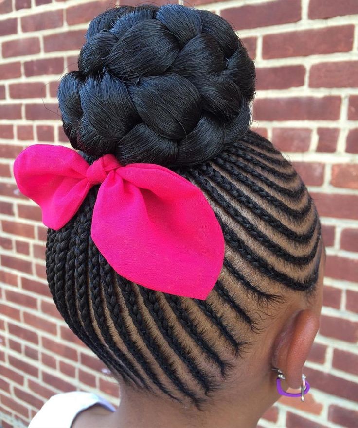 Young  girl with a bow topped halo bun