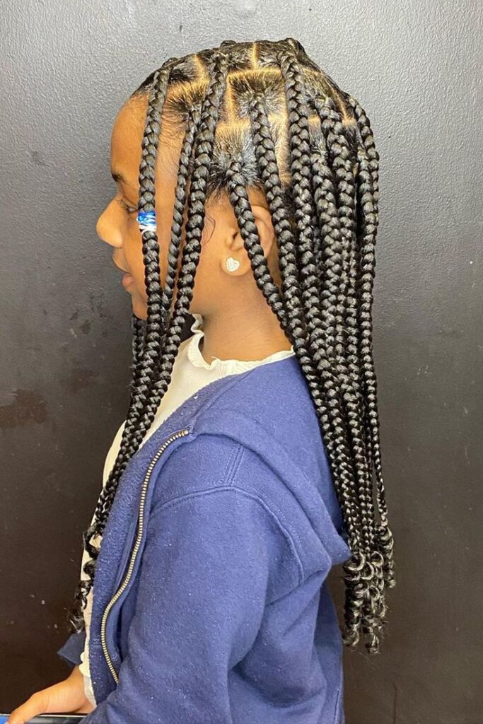 Young girl with medium knotless braids 