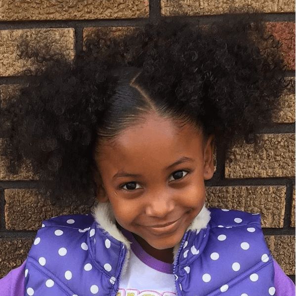 pretty girl with double high puffs