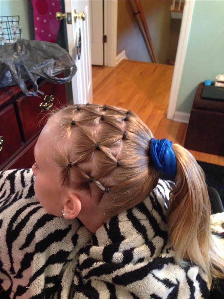 Young girl with a crisscross pontytail