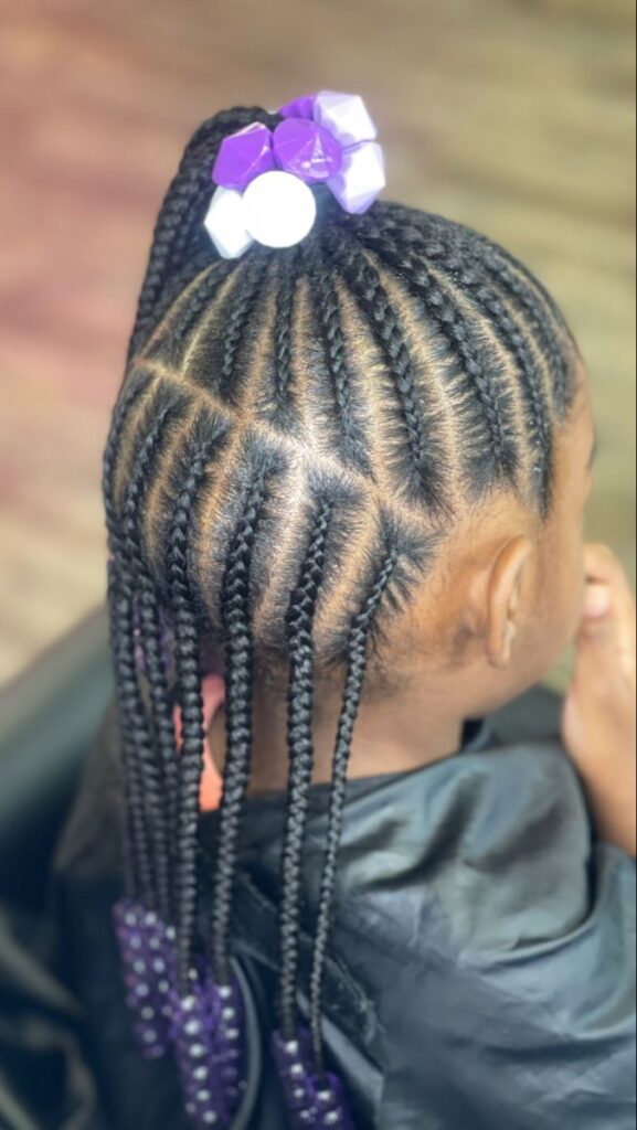 Young girl with a cute Half-Up Cornrows  with a cute bubble shaped band