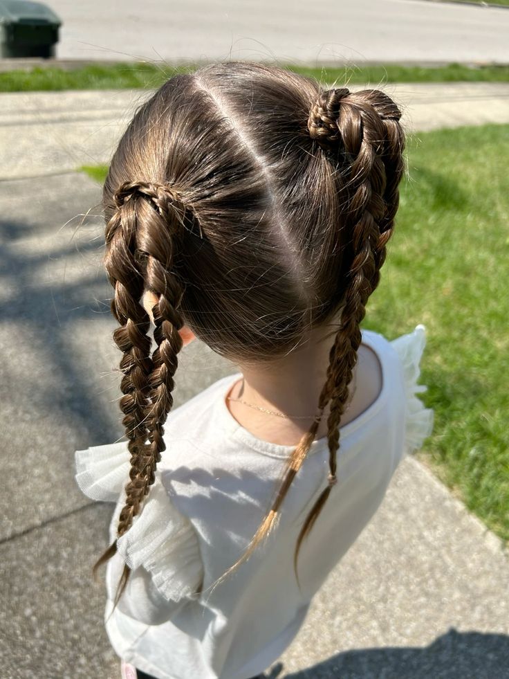 Little girl with a double ponytail