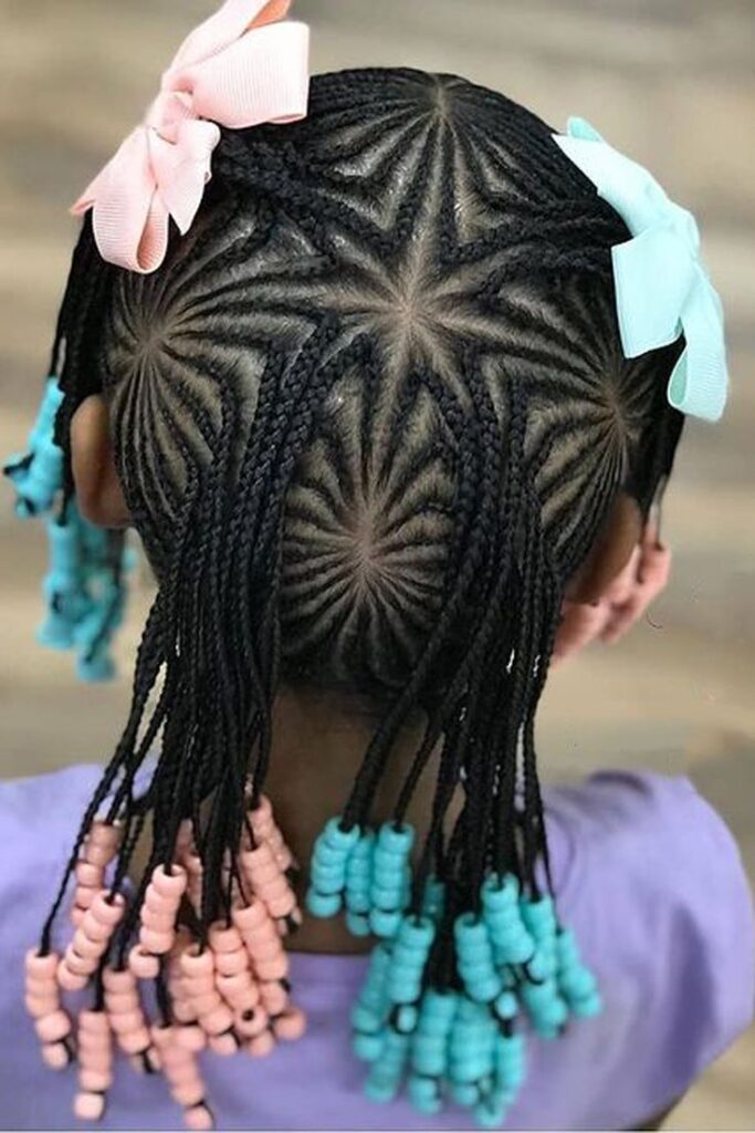 Young girl with Multiple Starburst Cornrows with beads a nd bows 