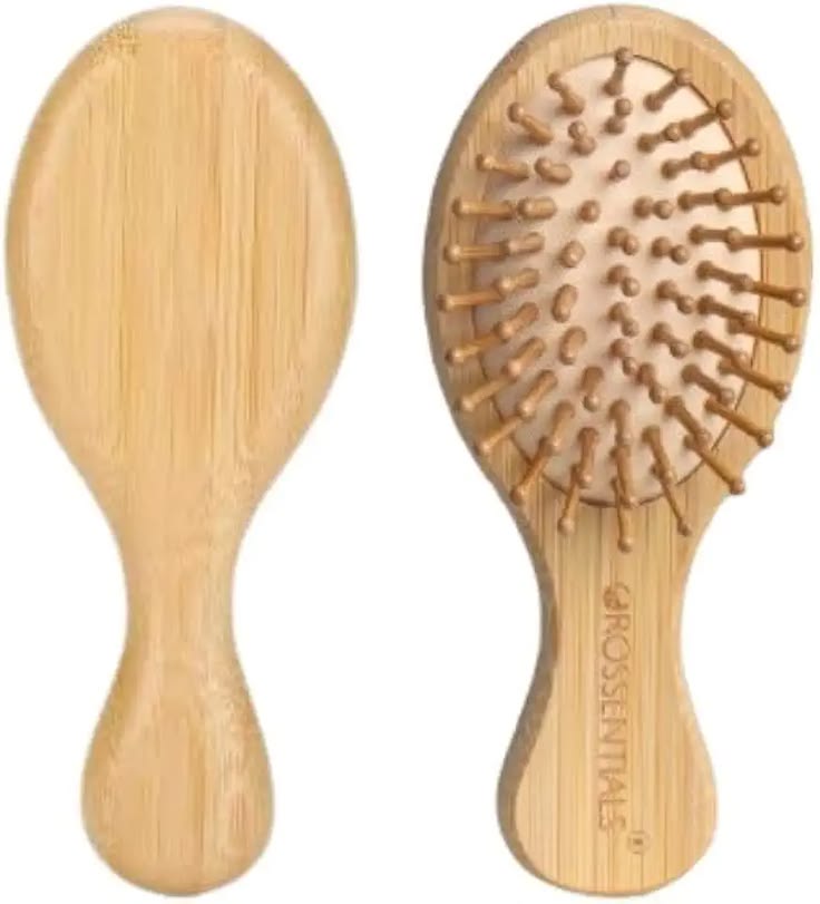A bamboo paddle brush with rounded pins, shown from the front and back.