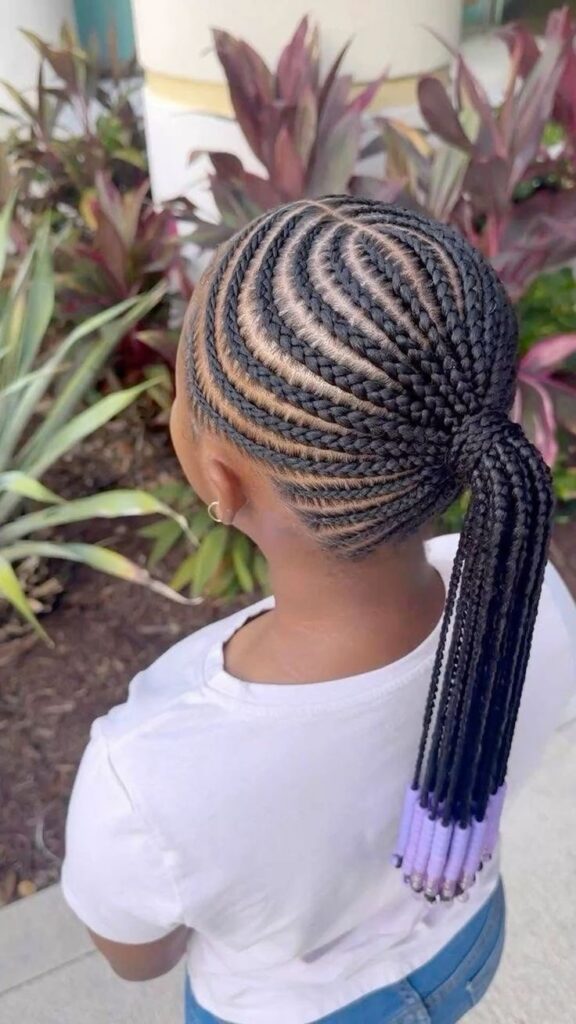 Young girl with Cornrows into a Low Ponytail