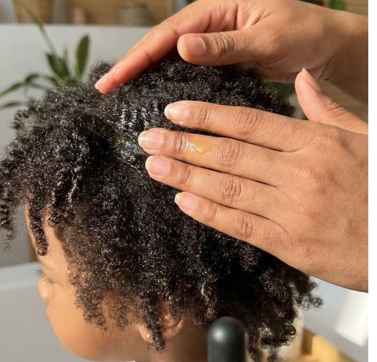Kid getting hair done)