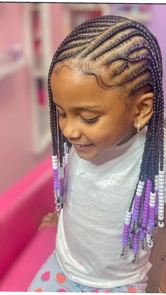 Child with beaded Fulani braids featuring cornrows and beaded ends