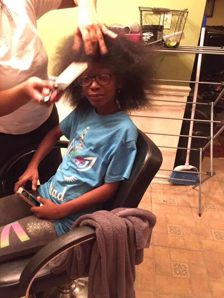 Detangling a child's natural hair before styling