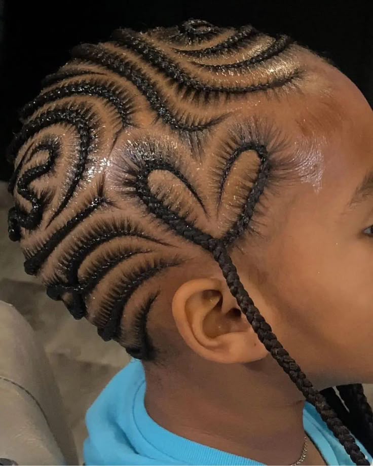 Young girl with a neat Heart-Shaped Cornrow Design