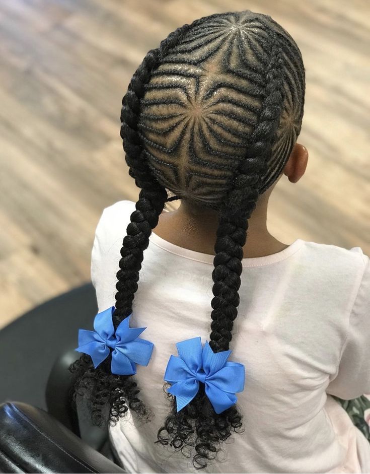Young girl with Center-Part Fishtail Cornrows with extra style and bows to finish