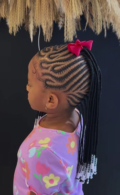 Young girl with a cute swirl Mohawk Cornrows 