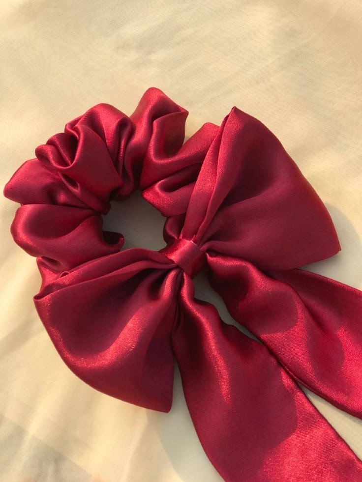 A piece or red Fabric scrunchie bow