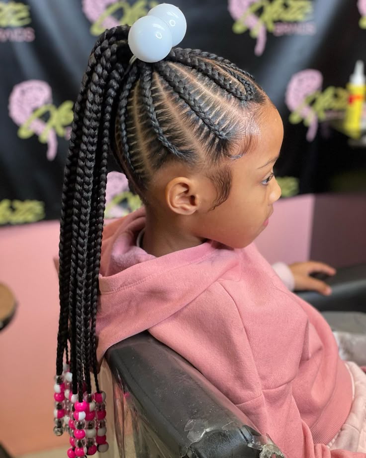 cute young girl with ponytail feed in braids