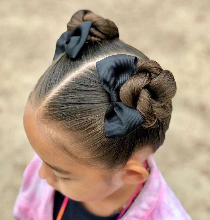 Young girl with hair double in a braided bun