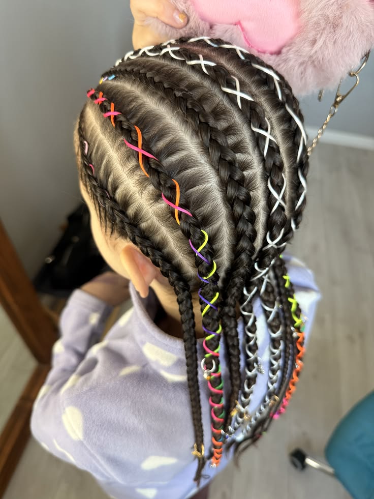Young girl with Cornrows with Colorful Thread Wraps