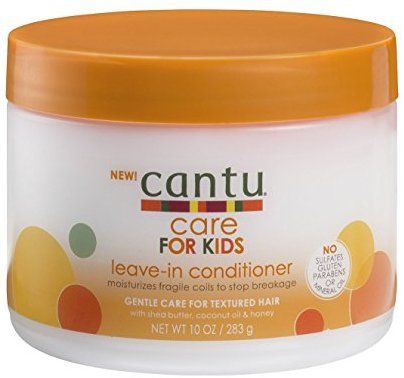 "A jar of Cantu Care for Kids Leave-In Conditioner made with shea butter, coconut oil, and honey for textured hair."
