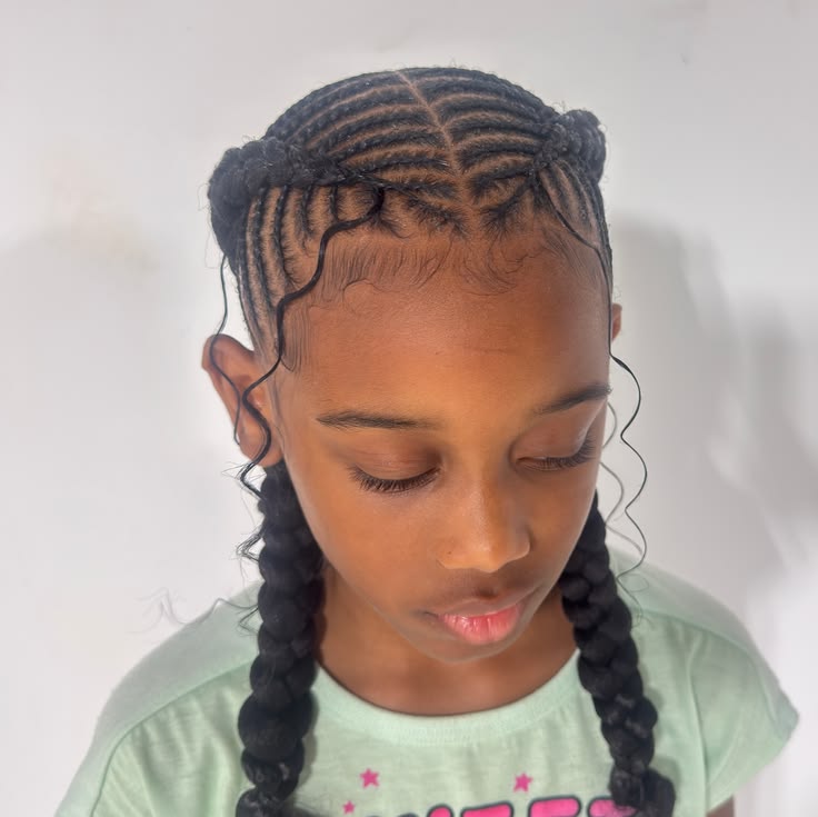 Fishbone braids with small, closely spaced rows creating a rib-like texture