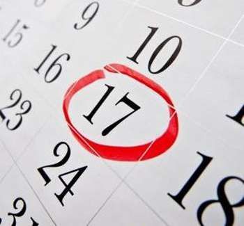 A calendar with a date circled in red marker