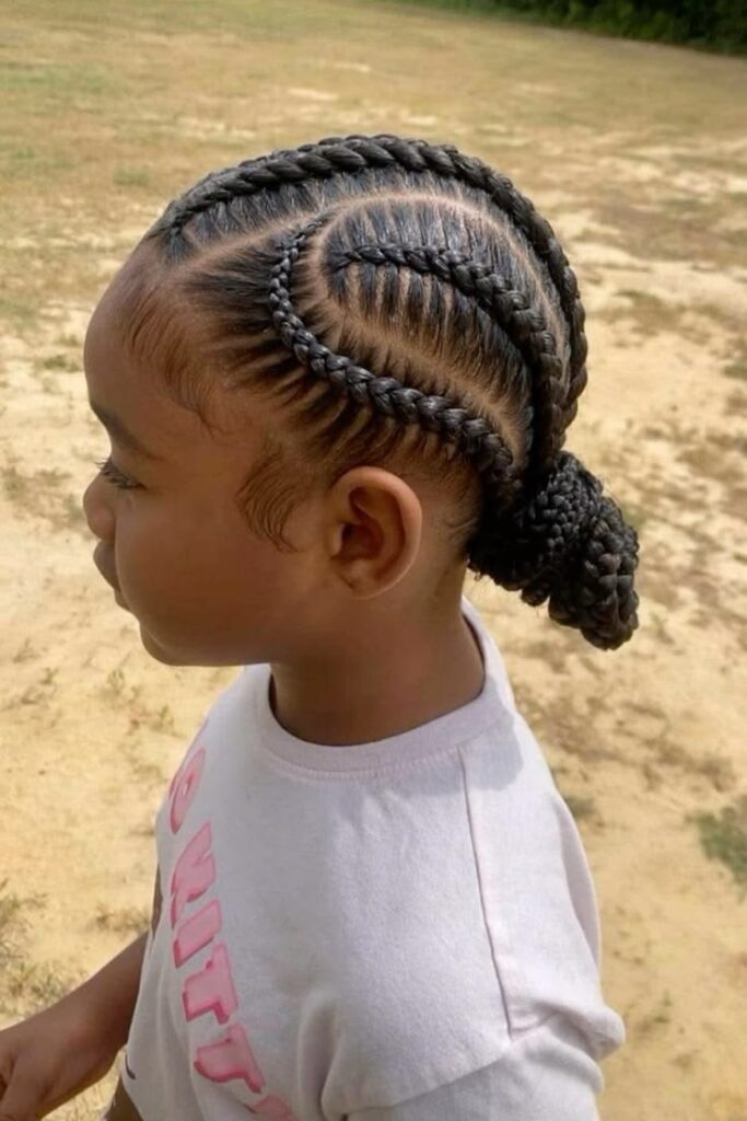Stitch braids styled straight back with a raised, sewn appearance