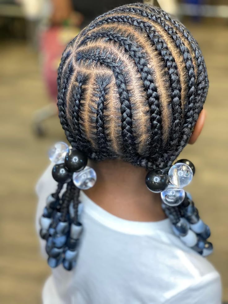 Cornrows with the main part shifted to one side for an asymmetrical look
