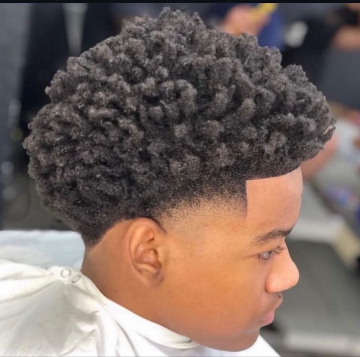 Sponge twists hairstyle for boys with fade