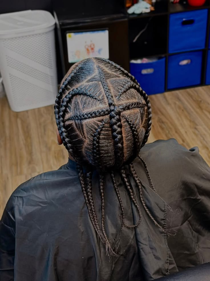 Boy with geometric stitch braids hairstyle