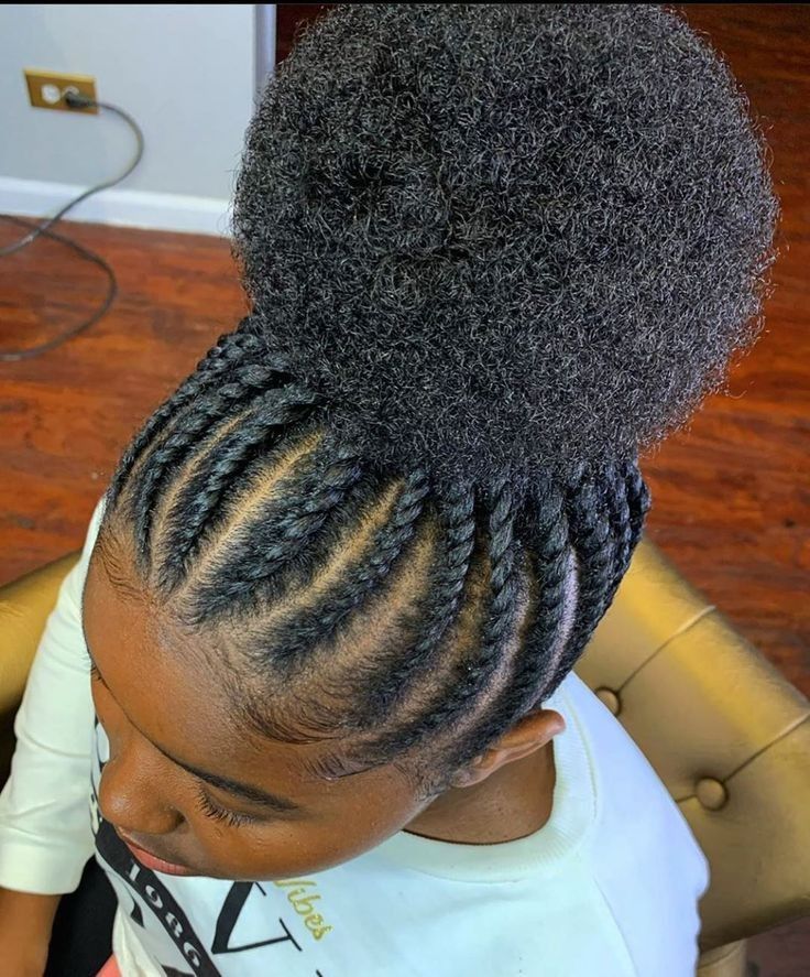 Girl with a flat twist updo with a puff