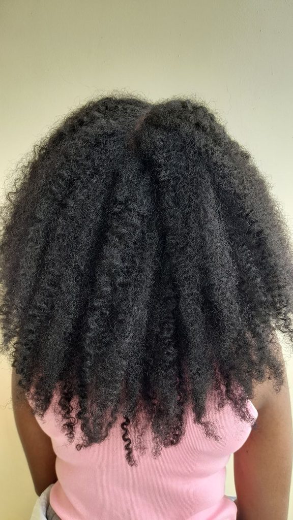 Back view of loose wavy braid-out curls