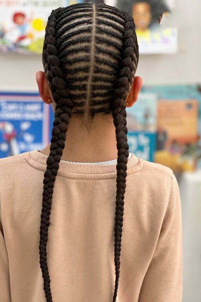 Girl with fishbone braids hairstyle