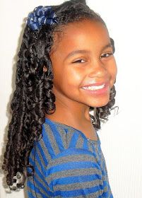 Smiling girl with spiral ringlet curls from curlformers