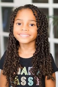 Little girl with thick, bouncy Havana twists styled with wavy ends