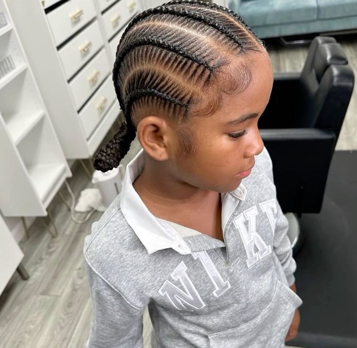 Young girl with a neatly style stitch braids hairstyle