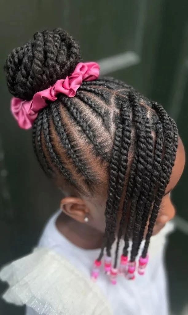 Protective hairstyle for kids with braids, bun, and beads