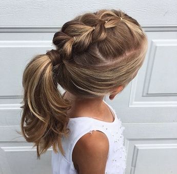 Girl with a Dutch braid leading into a low ponytail.