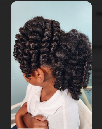 Girl with uniform ringlet curls from a flexi rod set